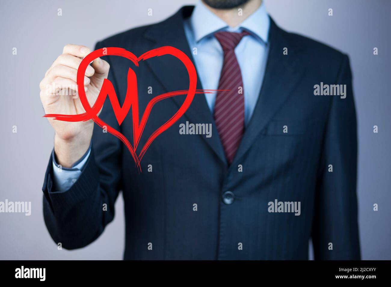 man hand pen drawing heart in screen Stock Photo