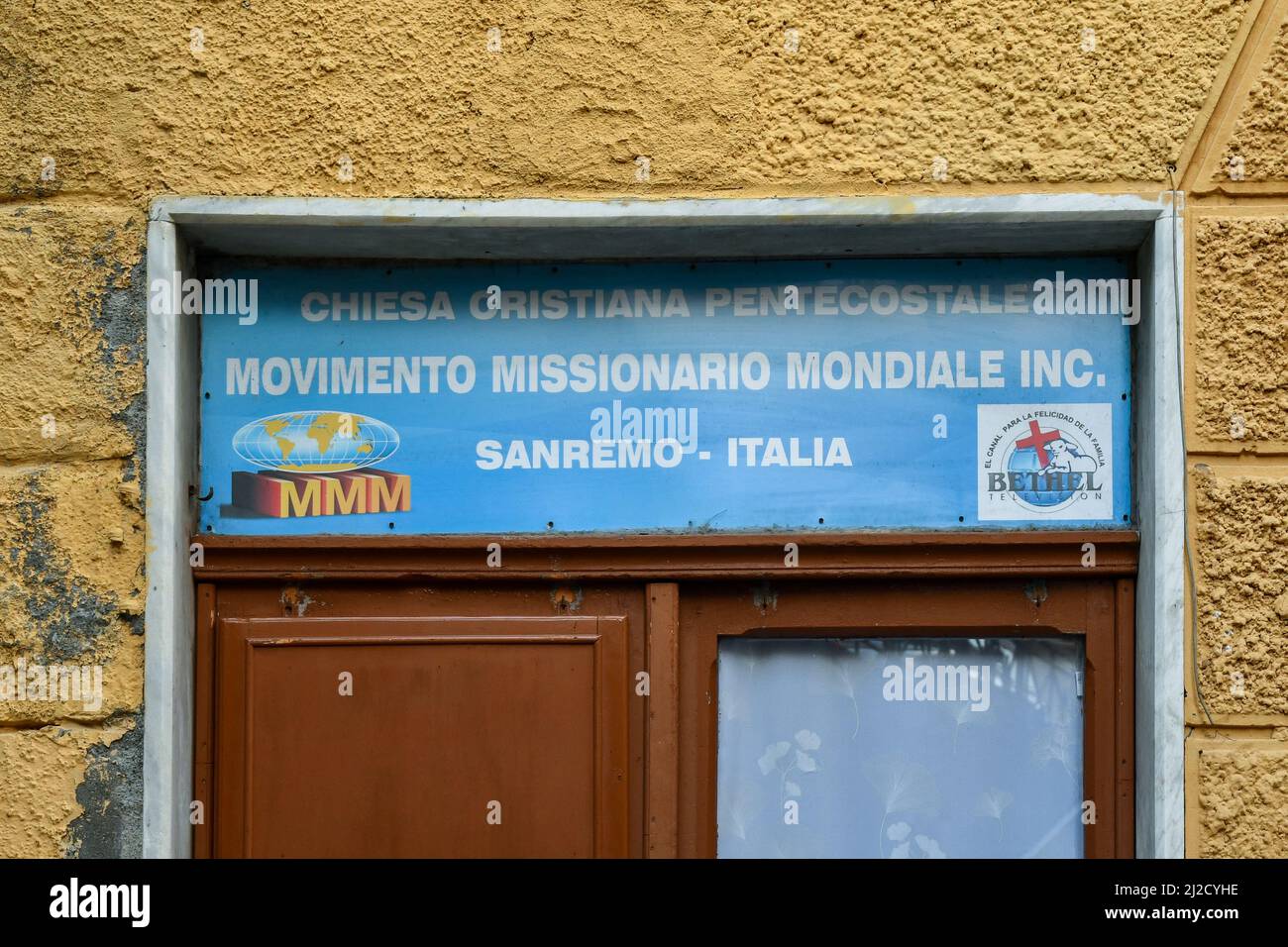 Entrance door and sign of the Worldwide Missionary Movement and of the humanitarian association Bethel, Sanremo, Imperia, Liguria, Italy Stock Photo