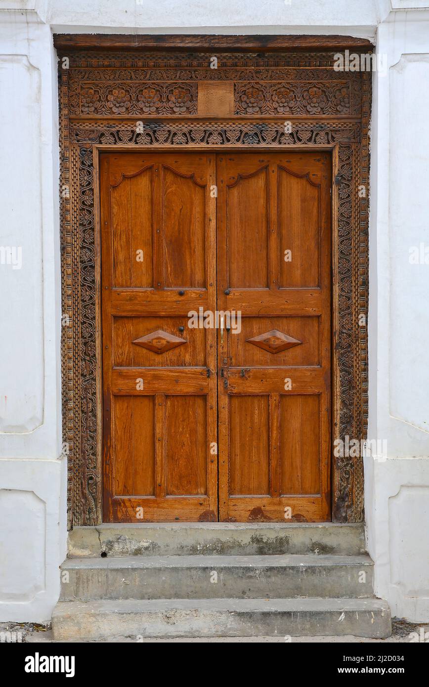 Wooden doors with Indianstyle carvings in Zanzibar, Tanzania, Africa Stock Photo Alamy