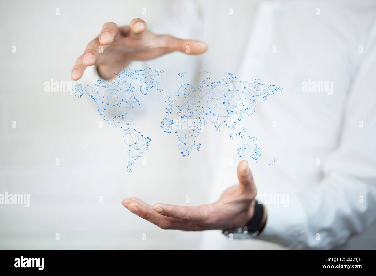 businessman holding world map in hands Stock Photo - Alamy