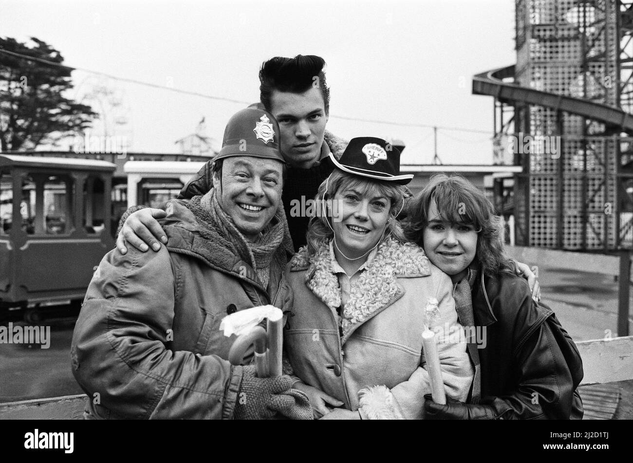 EastEnders went to Southend, Essex, to film the reunion of runaway Mark Fowler and his family. Bill Treacher (Arthur Fowler), David Scarboro (Mark Fowler), Susan Tully (Michelle Fowler) and Wendy Richard (Pauline Fowler). 20th November 1985. Stock Photo