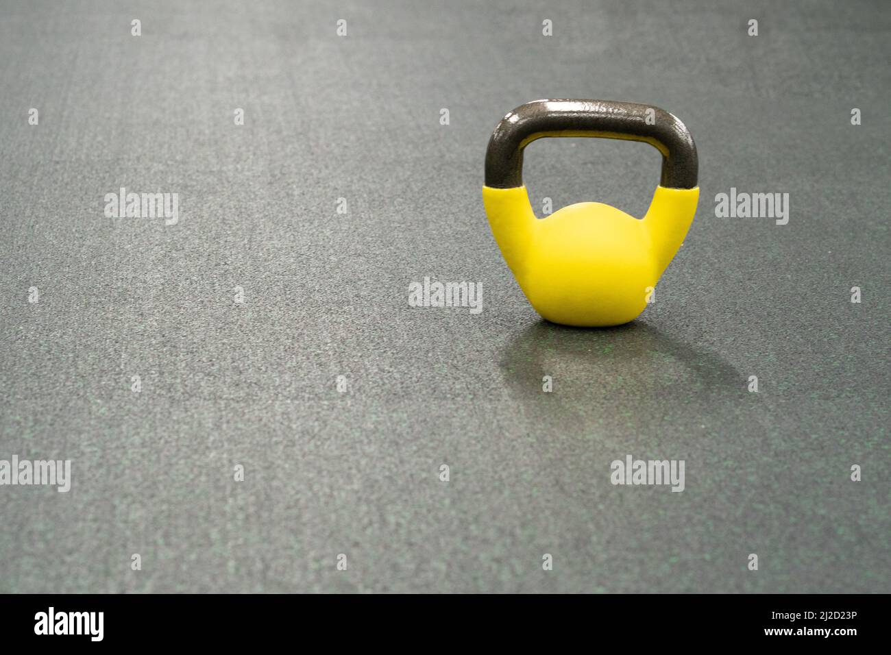 Yellow kettlebell weight healthy concept for workout equipment in bodybuilding from power training bright raining. Pace pound fitness physical Stock Photo Alamy