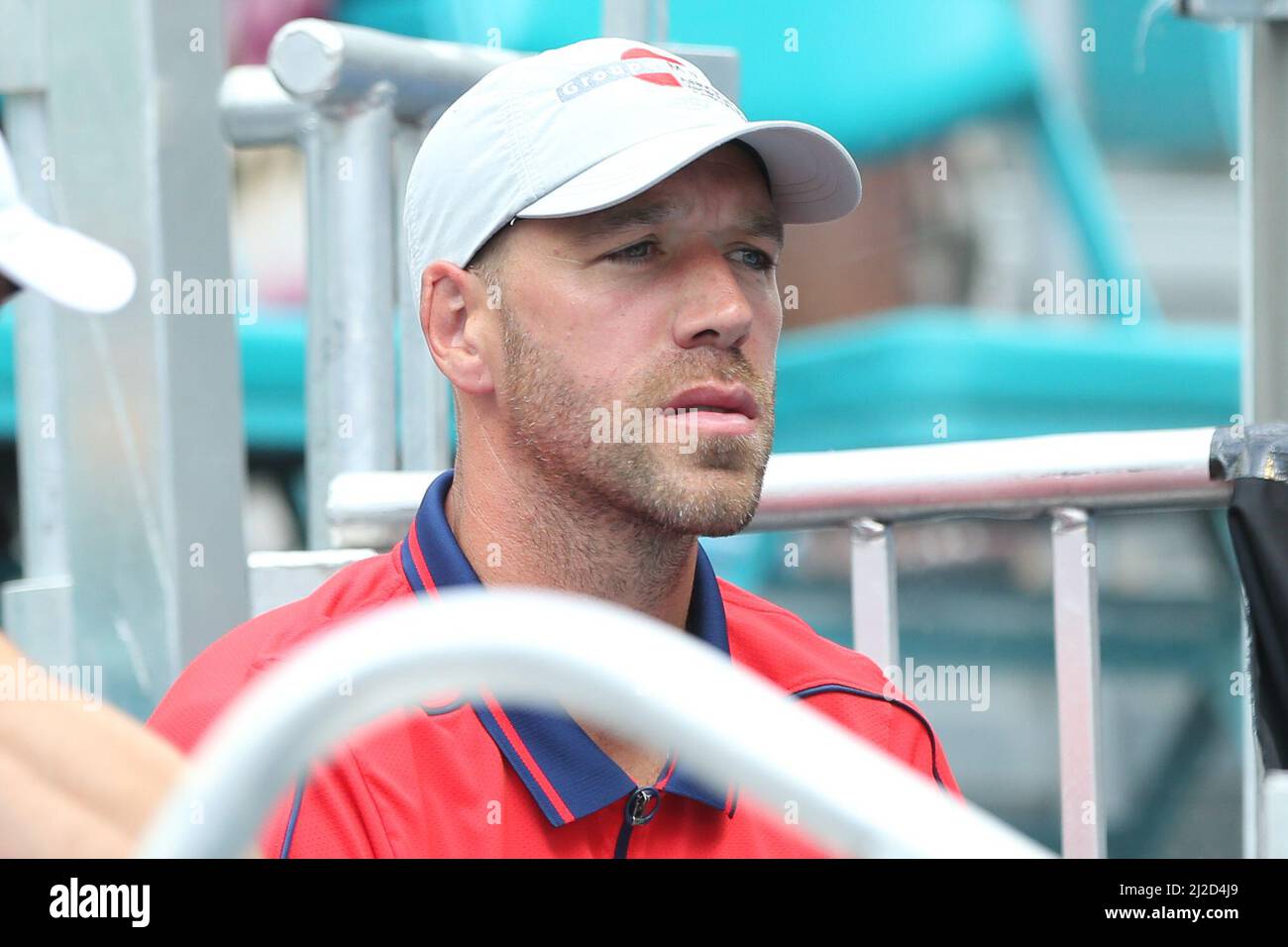 March 31, 2022, Miami Gardens, Florida, United States: Martin Hromkovic,  fitness trainer for Belinda Bencic, watches her women's singles semifinals  match at the Miami Open presented by Itau at Hard Rock Stadium