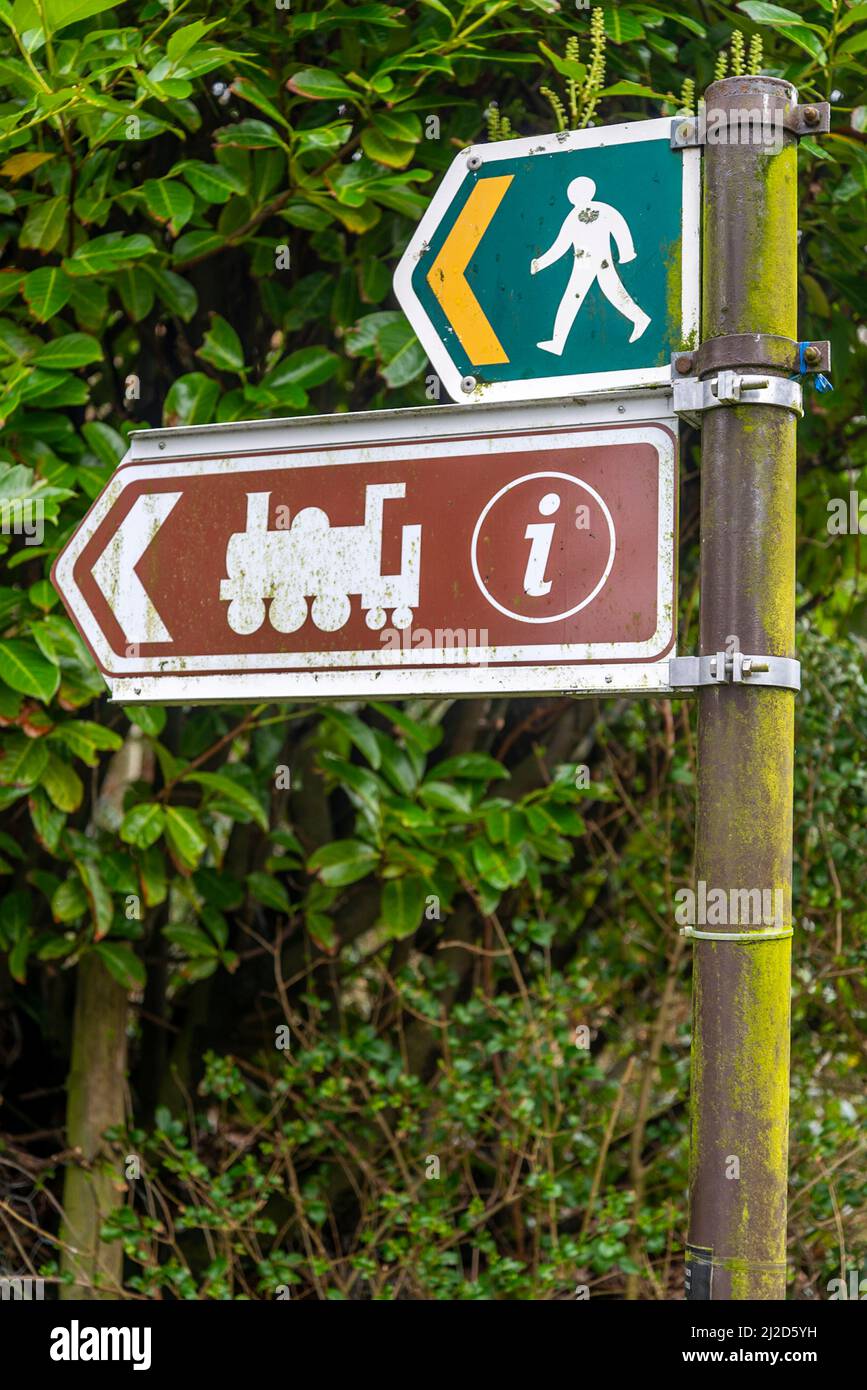 Directions To Mount Forest Snowdonia,North Wales,Uk-March 17Th 2022: Two Signs Show Directions To The  Nearby Train Halt,Used By Tourists To Ride Up To Mount Snowdon Stock Photo  - Alamy