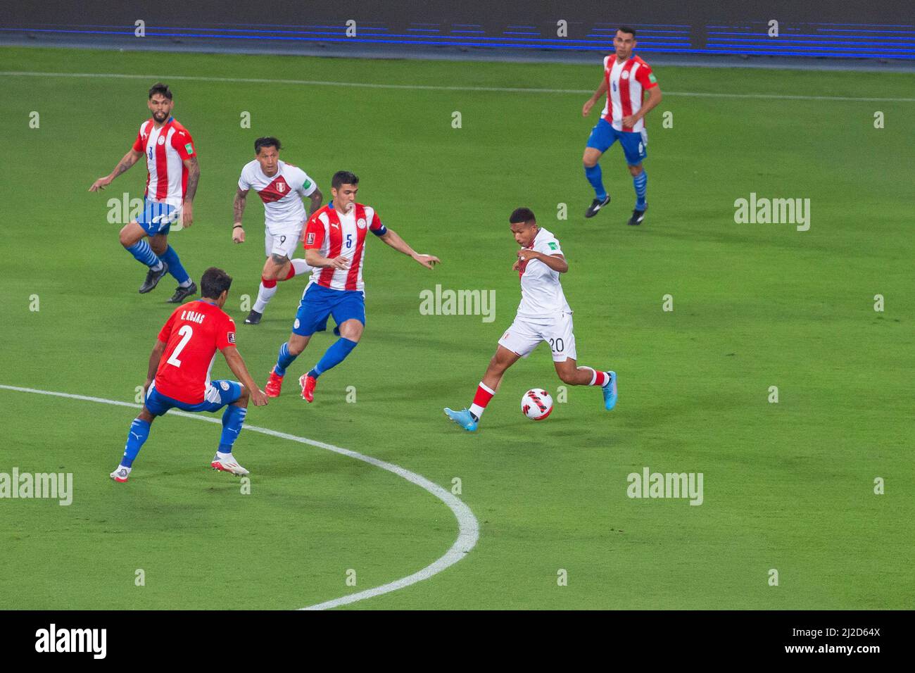 Lima, Peru. 29th Mar, 2022. Player Edison Flores (2nd R), from Peru, is marked by Fabian Balbuena (c) and Robert Rojas (l) from Paraguay during the CONMEBOL Qualifiers for the FIFA World Cup Qatar 2022 match at the National Stadium, in Lima (Credit Image: © Mariana Bazo/ZUMA Press Wire) Stock Photo