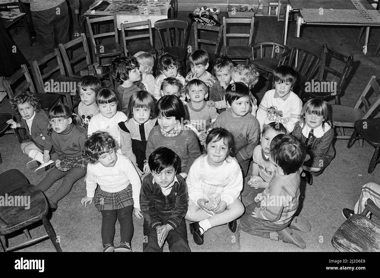 Children helping raise money for new toys at their playgroup. Some of the 50 children from Salendine Nook Baptist Playgroup who took part in a sponsored brick build. The two-day event in the church hall raised 200 pounds. 29th April 1986. Stock Photo