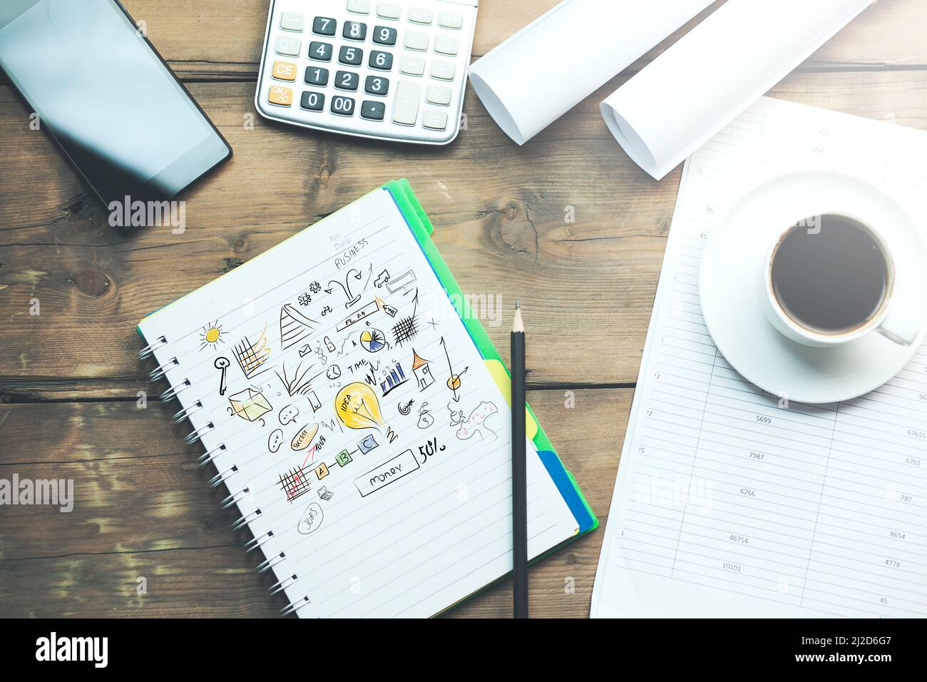 working wooden table on different office accessories Stock Photo