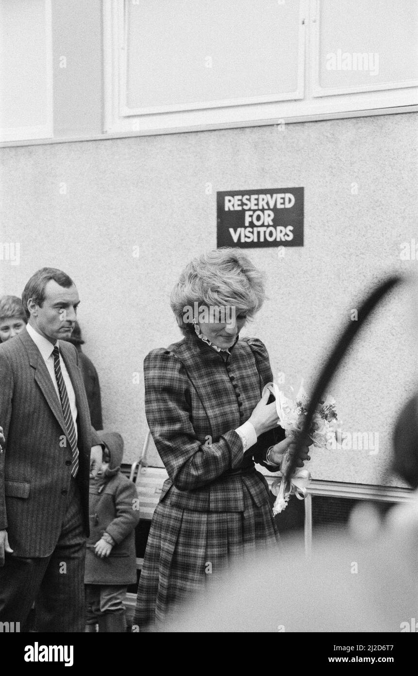 The Prince and Princess of Wales visit Mid Glamorgan in Wales.On this visit, they meet the local well-wishers outside a newly electronics plant.  Picture shows Princess Diana and behind her, her bodyguard Barry Mannakee wearing a diagonal striped tie and slight pin striped jacket.  Picture taken 29th January 1985 Stock Photo