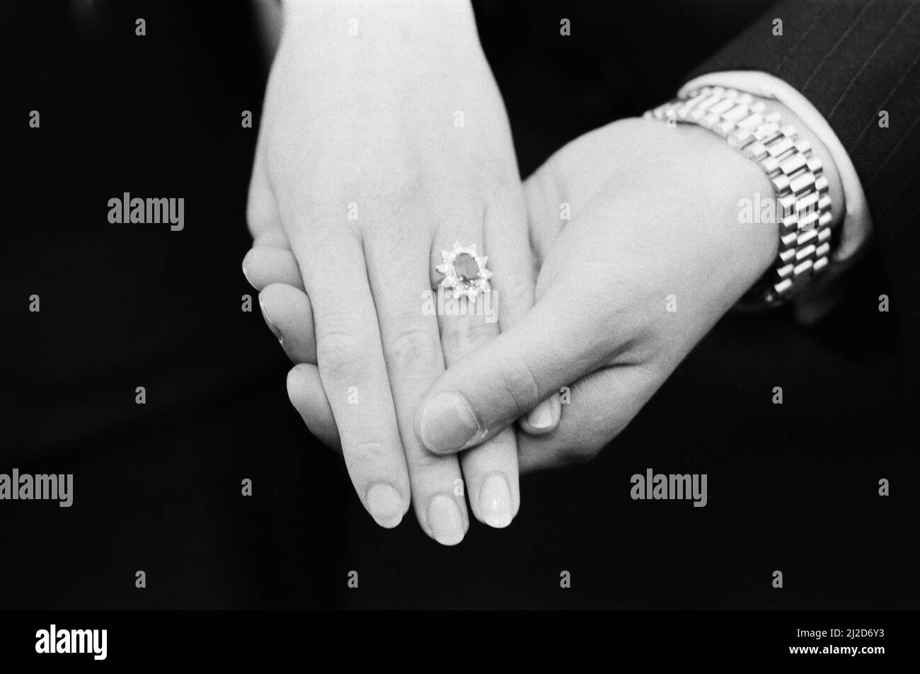 Sarah Ferguson and Prince Andrew announce their engagement at Buckingham Palace, Picture shows Sarah Ferguson's engagement ring, as Andrew holds her hand, taken 19th March 1986 Stock Photo