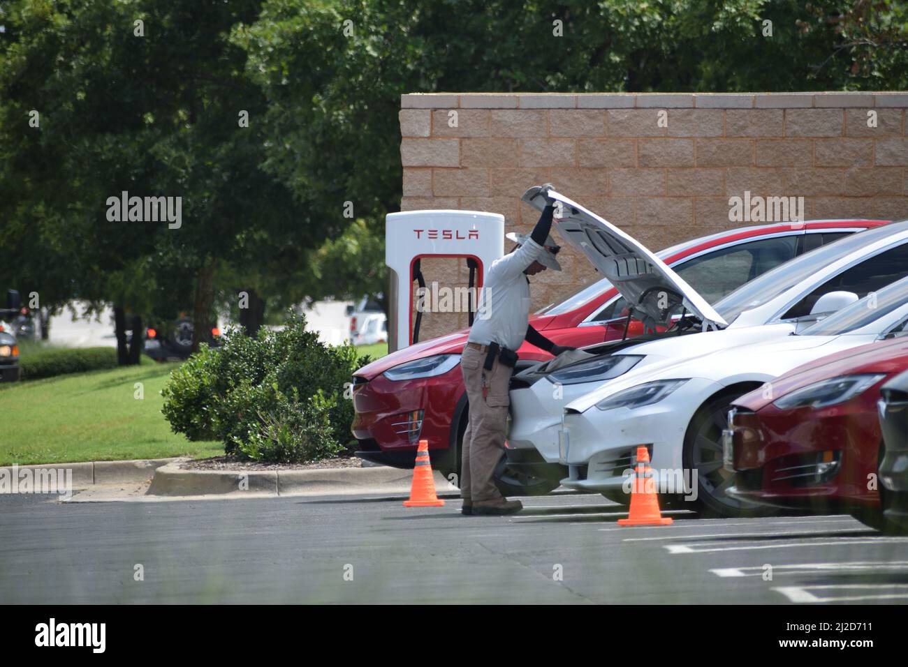 Tesla vehicles being charged at a Tesla charging station in Southlake ...