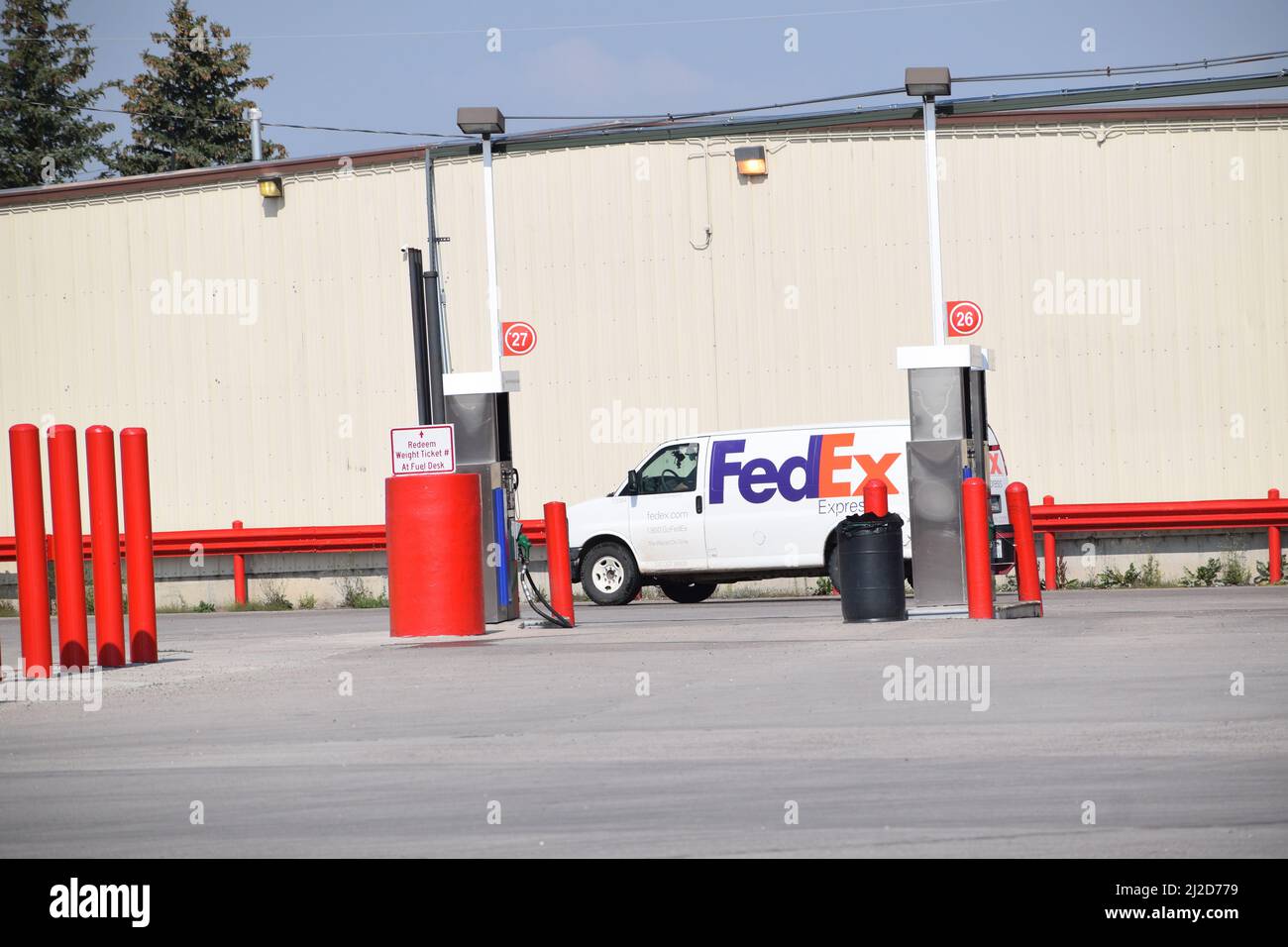 A FedEx van at Sapp Bros Truck Stop on the east side of Cheyenne Wyoming; August 2021 Stock Photo