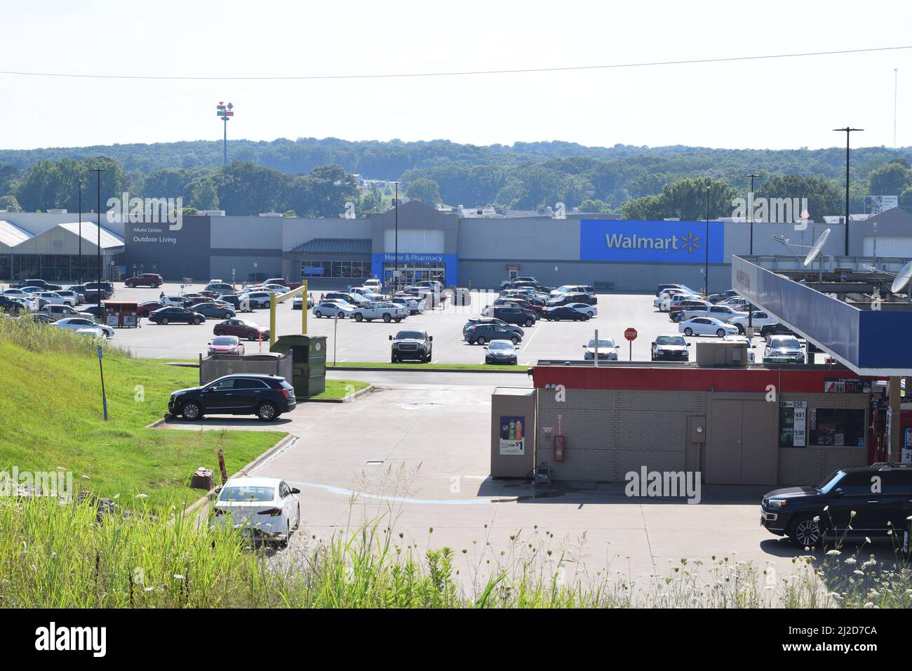 Wide view of a Walmart Murphy gas station and a Walmart store in the distance in Rockport, Arkansas Stock Photo