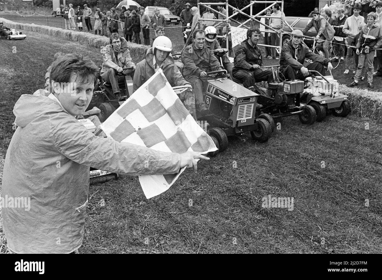 Competitors for the great 'Lawn Mower Grand Prix' lineup on the 'Sands