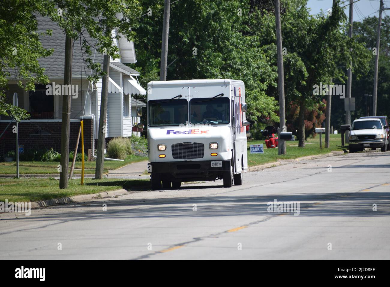 A FedEx delivery truck parked on Illinois Route 49 in the small town of Rankin, Illinois Stock Photo