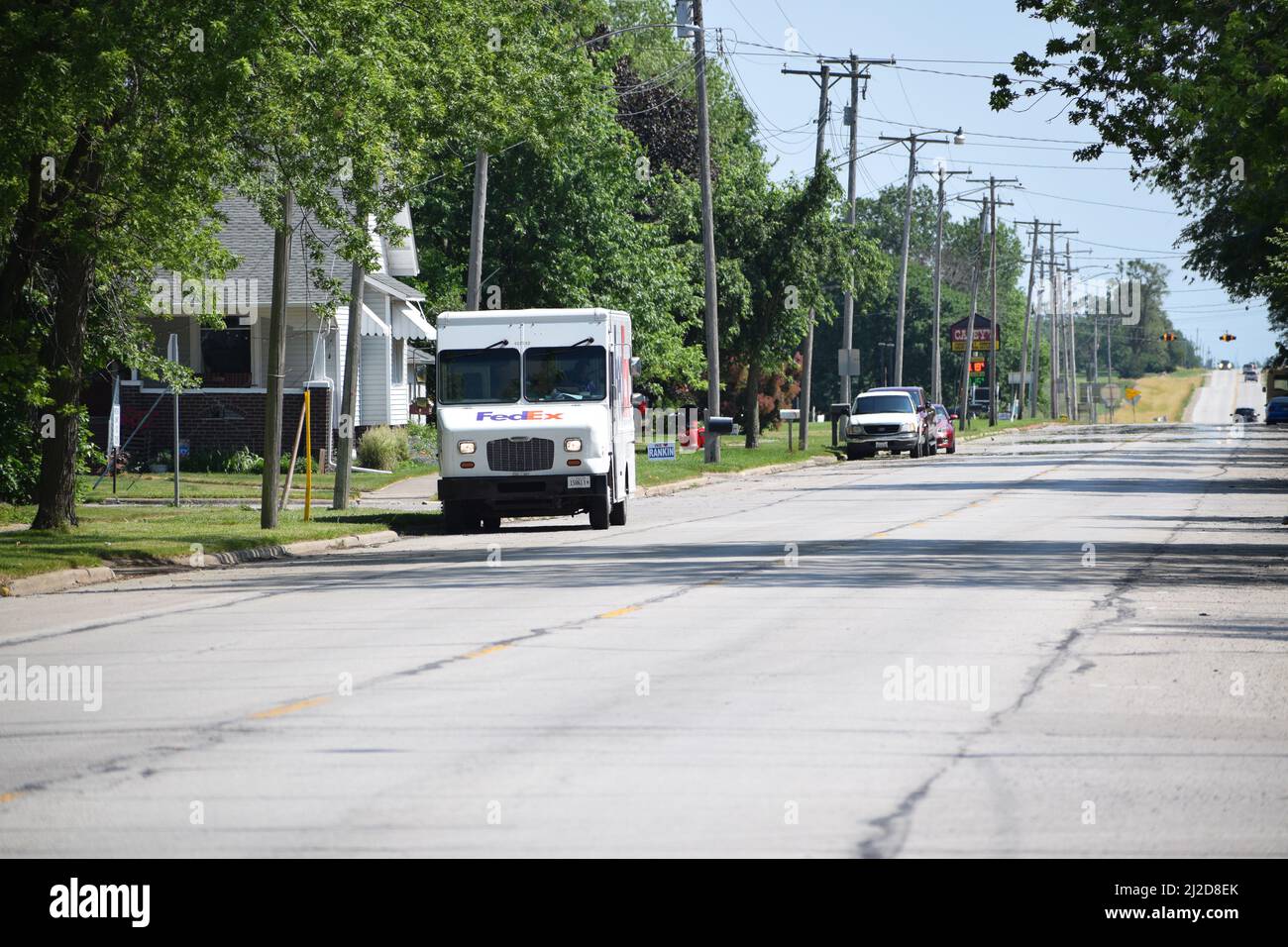 A FedEx delivery truck parked on Illinois Route 49 in the small town of Rankin, Illinois Stock Photo