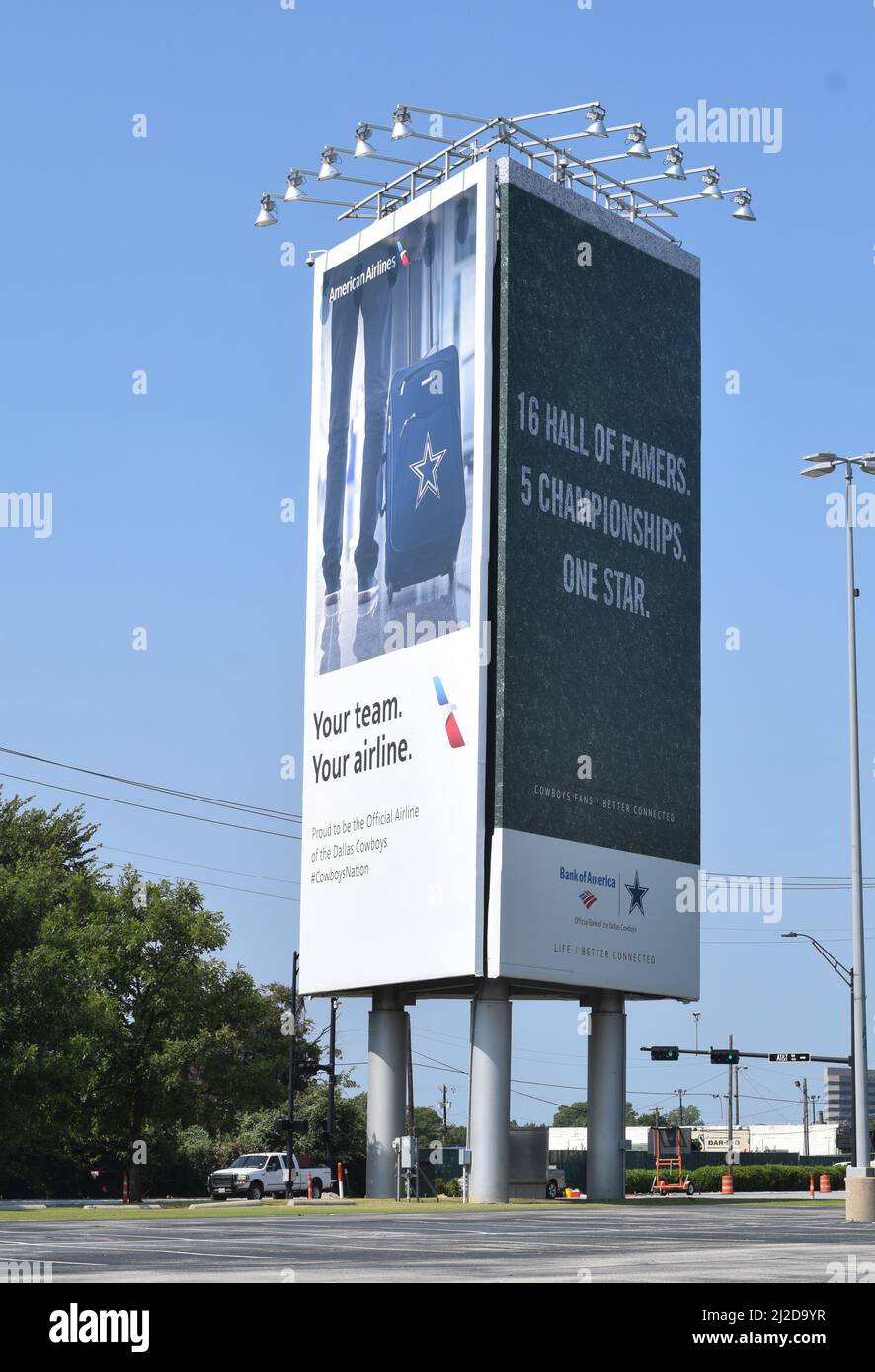 A Bank America and American Airlines advertisement on a billboard in a ...