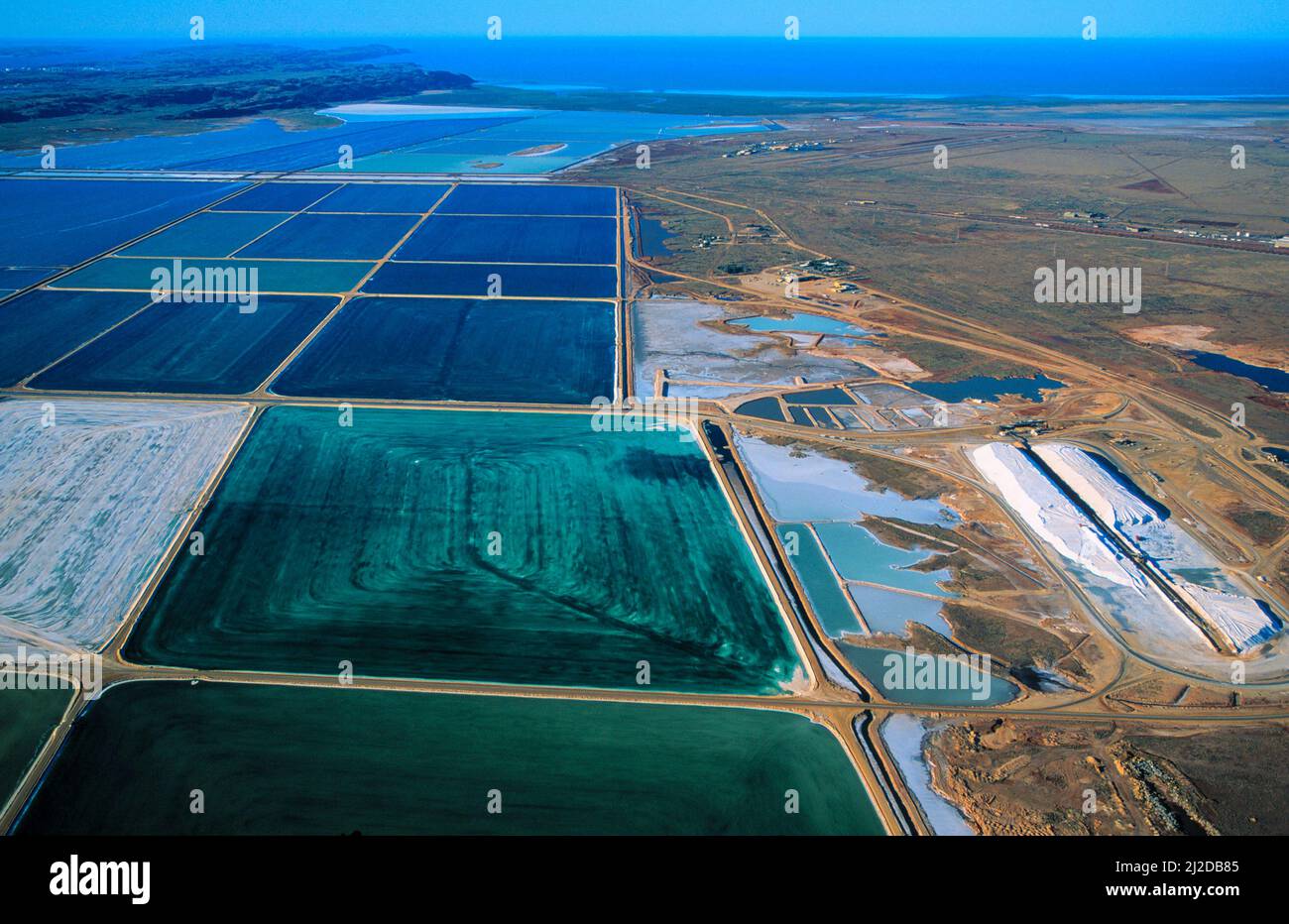 Salt mining at Dampier western Australia, showing the dyed salt ponds
