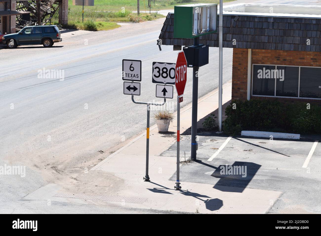 Texas highway signs (Highway 6 and U.S. Highway 380) on a street corner in Rule Texas Stock Photo