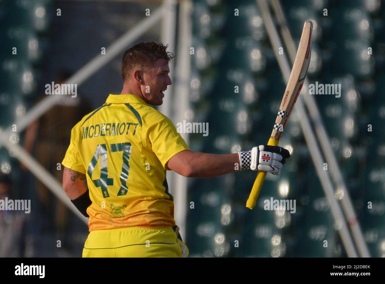Lahore, Pakistan. 31st Mar, 2022. Australian player Ben McDermott completed his 100 runs during second One-day International (ODI) cricket match between Pakistan and Australia at the Gaddafi Cricket Stadium in Provincial Capital. (Photo by Rana Sajid Hussain/Pacific Press) Credit: Pacific Press Media Production Corp./Alamy Live News Stock Photo