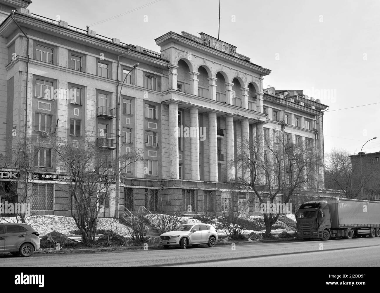 Novosibirsk, Siberia, Russia, 03.27.2022. The building at the river