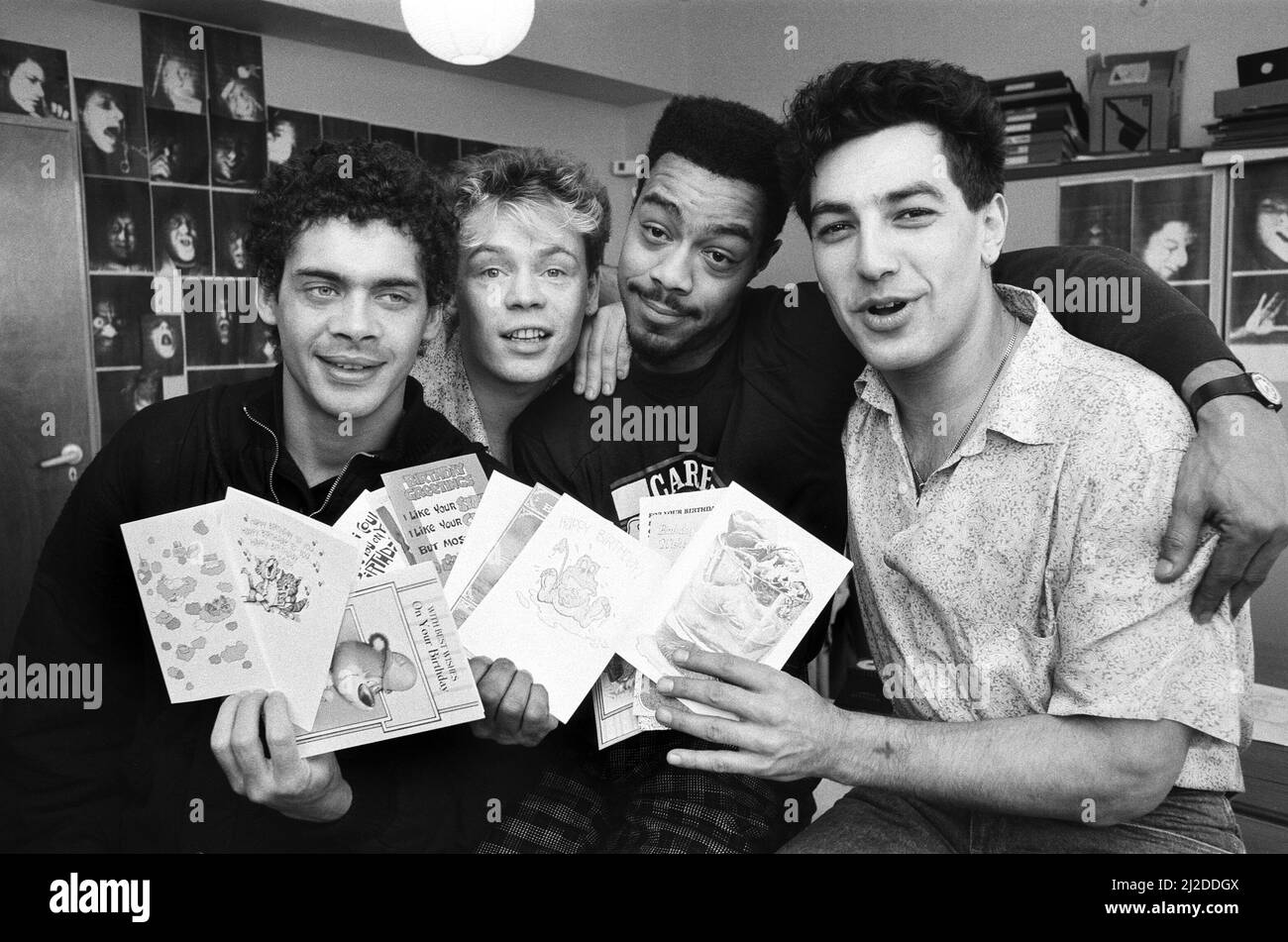 UB40 celebrating the birthdays of three of their members who have birthdays within the same week - Earl Falconer, Norman Hassan and Mickey Virtue. Pictured, left to right, Mickey Virtue, Ali Campbell, Earl Falconer and Norman Hassan. 22nd January 1986. Stock Photo
