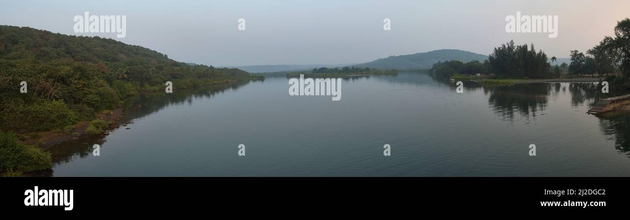 The Aare Waare Beach lies between Ganapatiphule and Ratnagiri. Not as crowded, it has this beautiful estuary nearby as well. Stock Photo