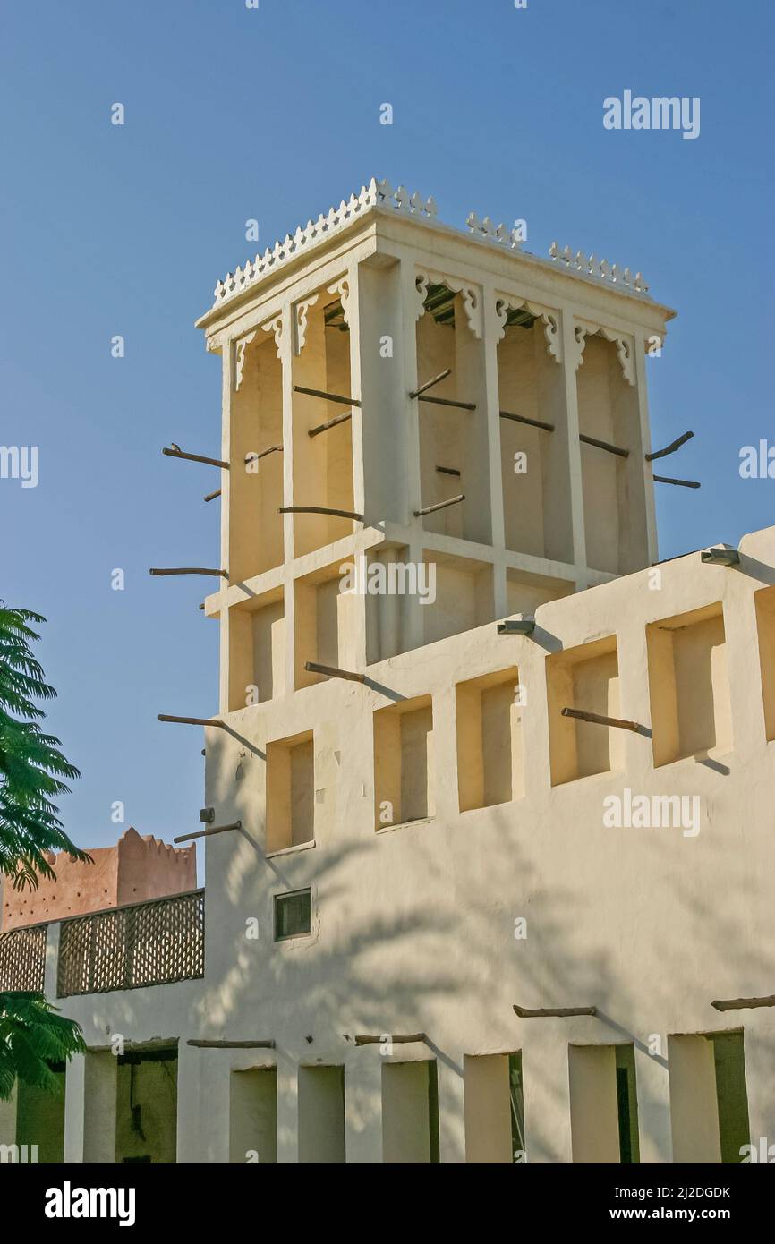The magnificent wind tower at Ras al Kaimah Fort, in the UAE, seen from the shaded courtyard. Stock Photo
