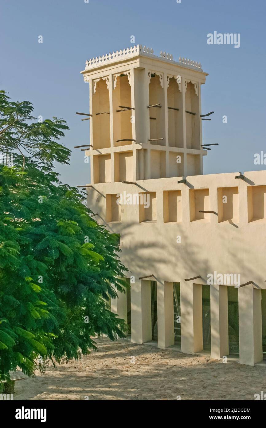 The magnificent wind tower at Ras al Kaimah Fort, in the UAE, seen from the shaded courtyard. Stock Photo