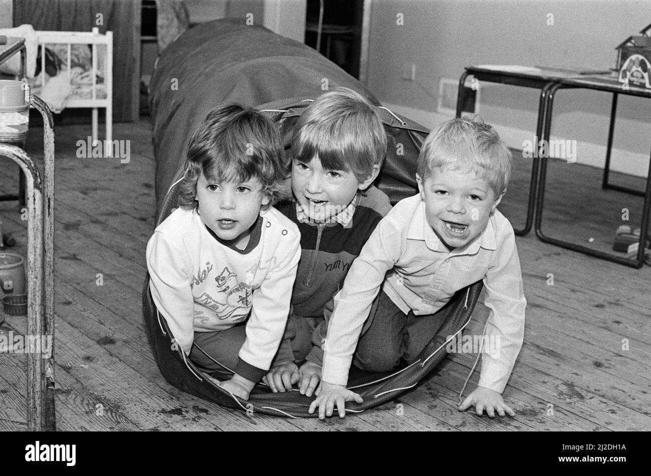 Raring to go! Youngsters Kathryn Wigley, John Steel and James Gledhill get to grips with the obstacles at Birchencliffe Playgroup¿ sponsored race. Some 42 children tackled 10 obstacles in two races to raise money to buy new toys for the group, which meets at Birchencliffe Parish Hall. 4th March 1986 Stock Photo