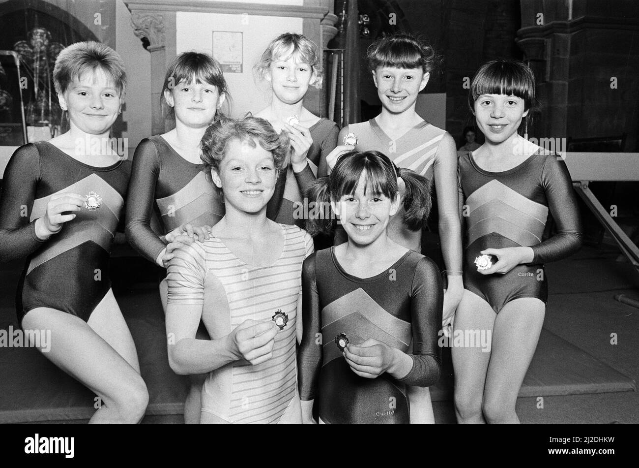 Greenhead Gymnastics Club have reached the Yorkshire Championships at Leeds in July, thanks to their silver-medal-winning performance in the West Yorkshire Championships. Rebecca Moore - front, right - won the gold medal in the Under 11 group and added a silver at Under 12 level and Karen Hargate (front, left) was a gold medalist at Under 14 level. Other members of the successful team were (back, from left) Shelley Cooper, Estelle Stringer, Joanne Brooksbank, Lisa Harris and Johanna Stansfield. 29th April 1986. Stock Photo