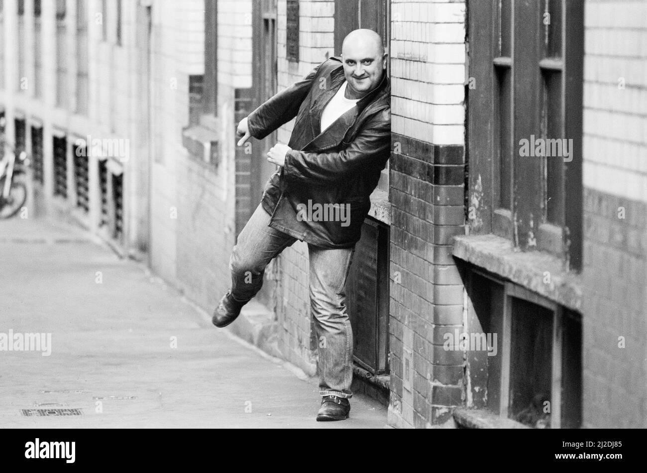 Liverpudlian comedian Alexei Sayle who starred in the BBC television comedy series The Young Ones, pictured in London. 17th May 1985. Stock Photo