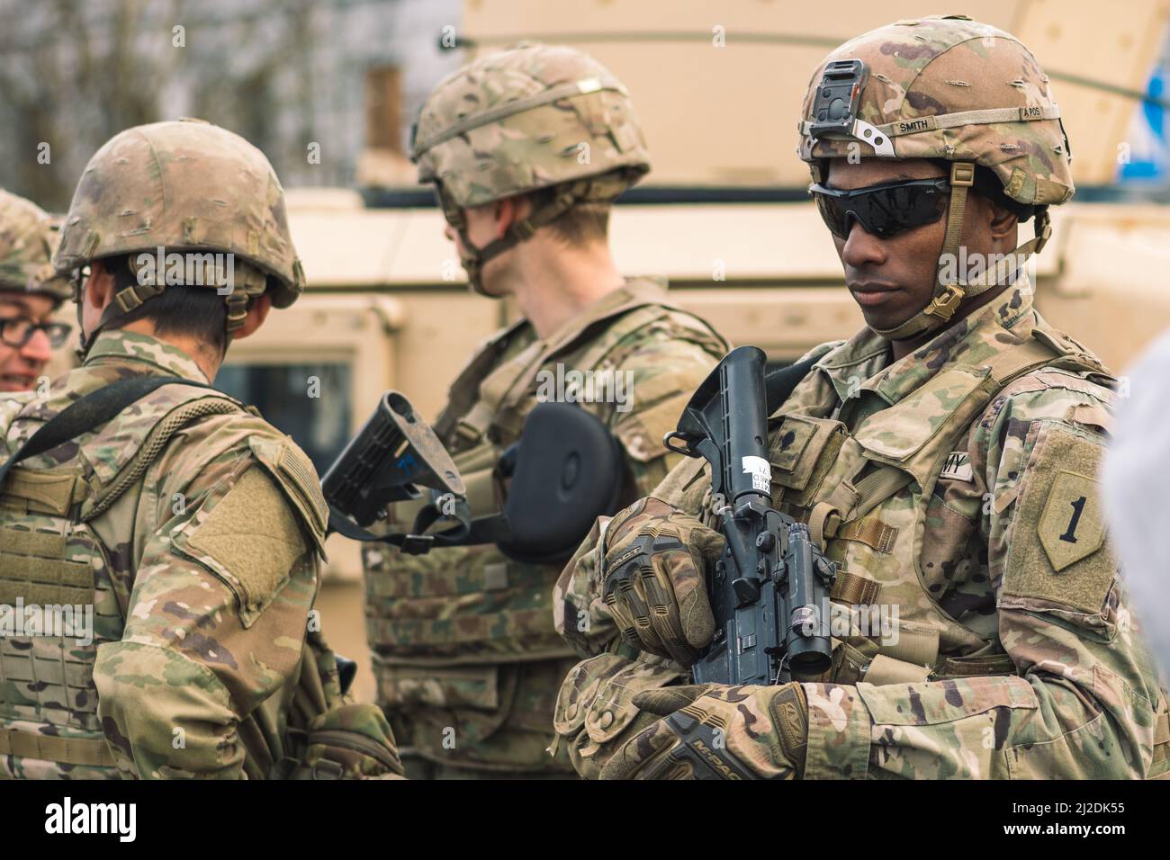 United States Marine Corps soldiers with shotguns or rifles, helmets ...