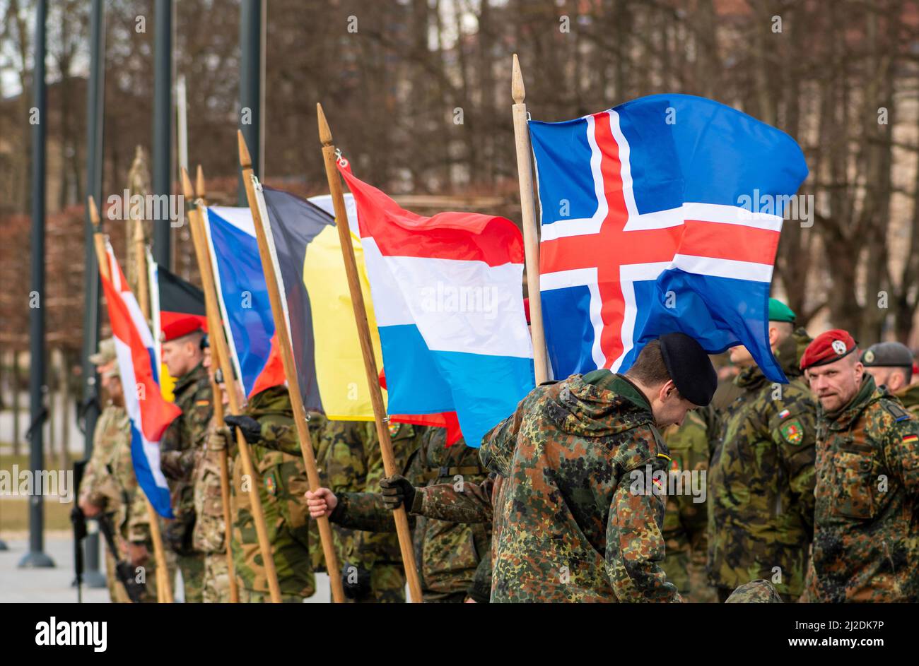 Vilnius, Lithuania - March 29 2022: Flags of various European countries members of NATO force integration unit, close up Stock Photo