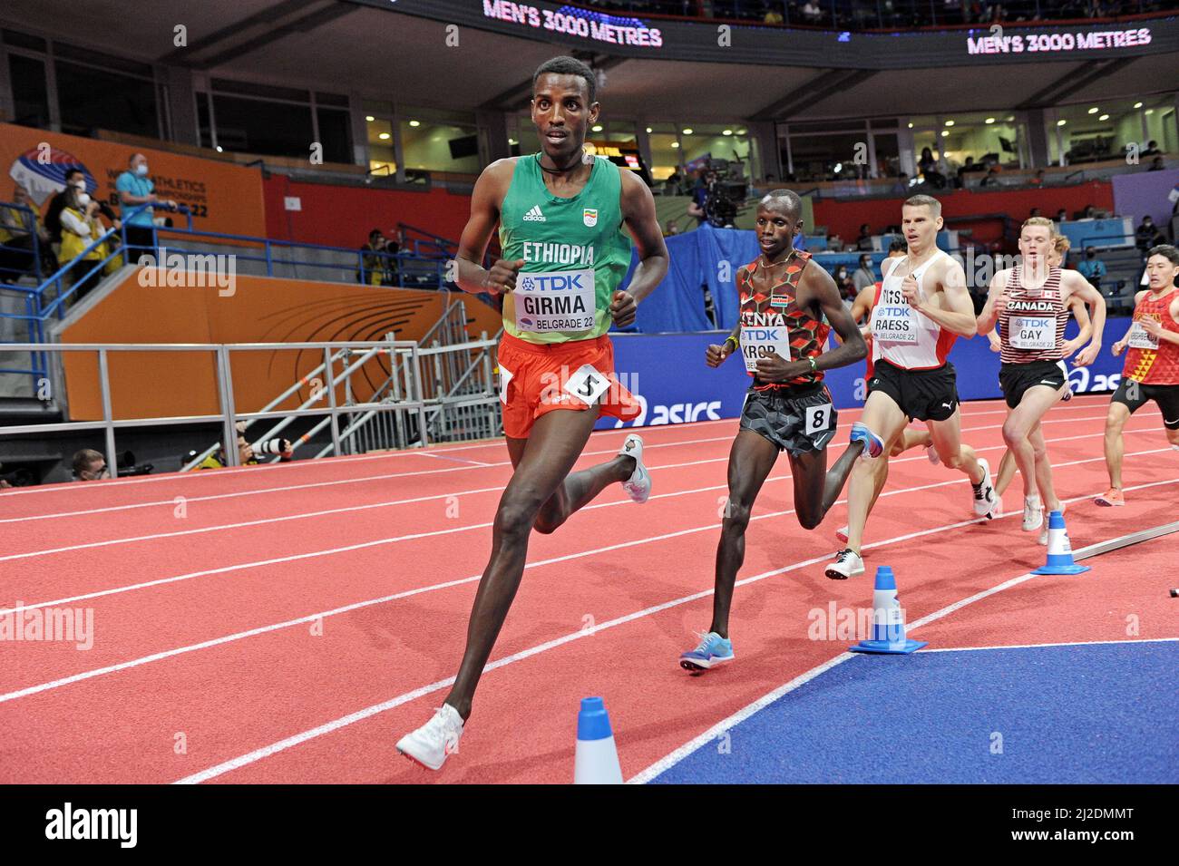 Lamecha Girma (ETH) leads Jacob Kiprop (KEN) and Marc Scott (GBR) in