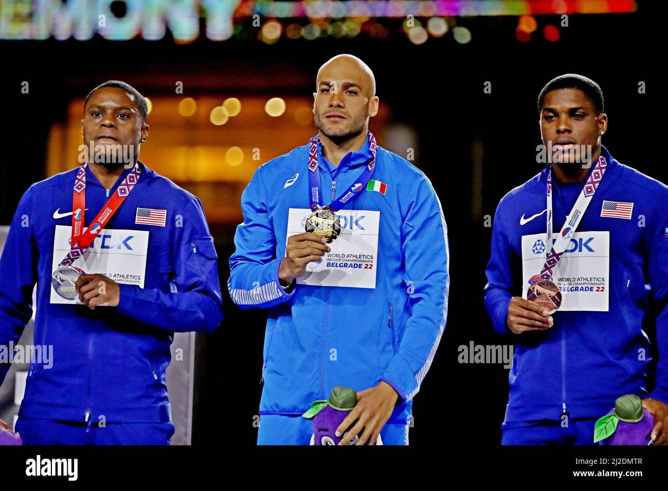 Men's 60m gold medalist Lamont Marcell Jacobs (GRE), center, poses with silver medalist Christian Coleman (USA), left, and bronze medalist Marvin Brac Stock Photo