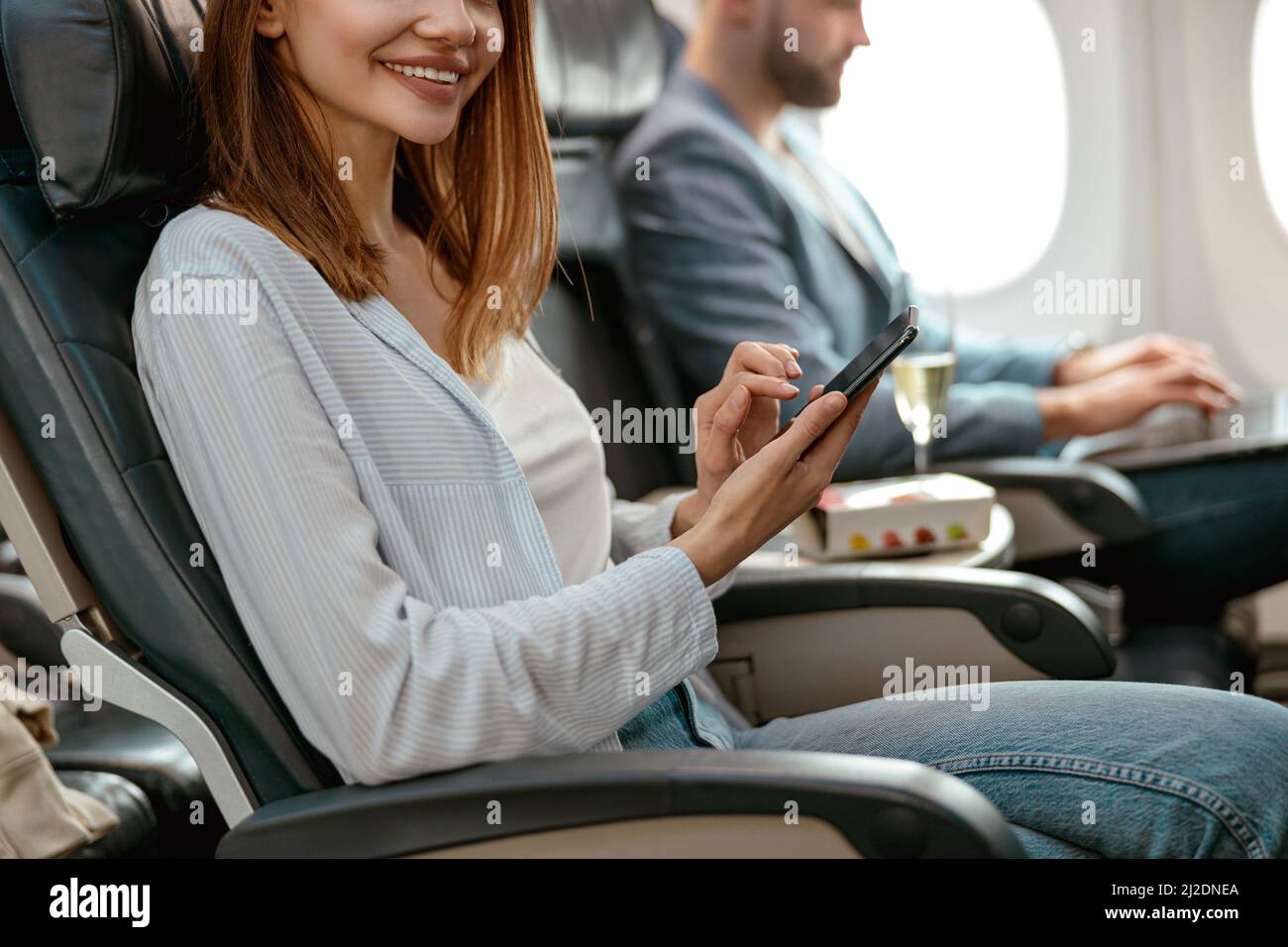 Cheerful woman passenger using hi-res stock photography and images - Alamy