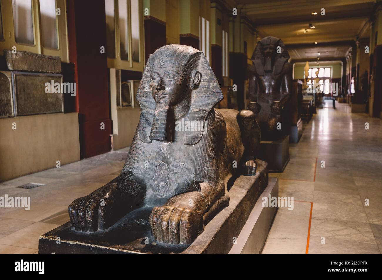 Big Stone Ancient Egyptian statues in the Cairo Egyptian Museum, the oldest archaeological museum in the Middle East, Egypt Stock Photo