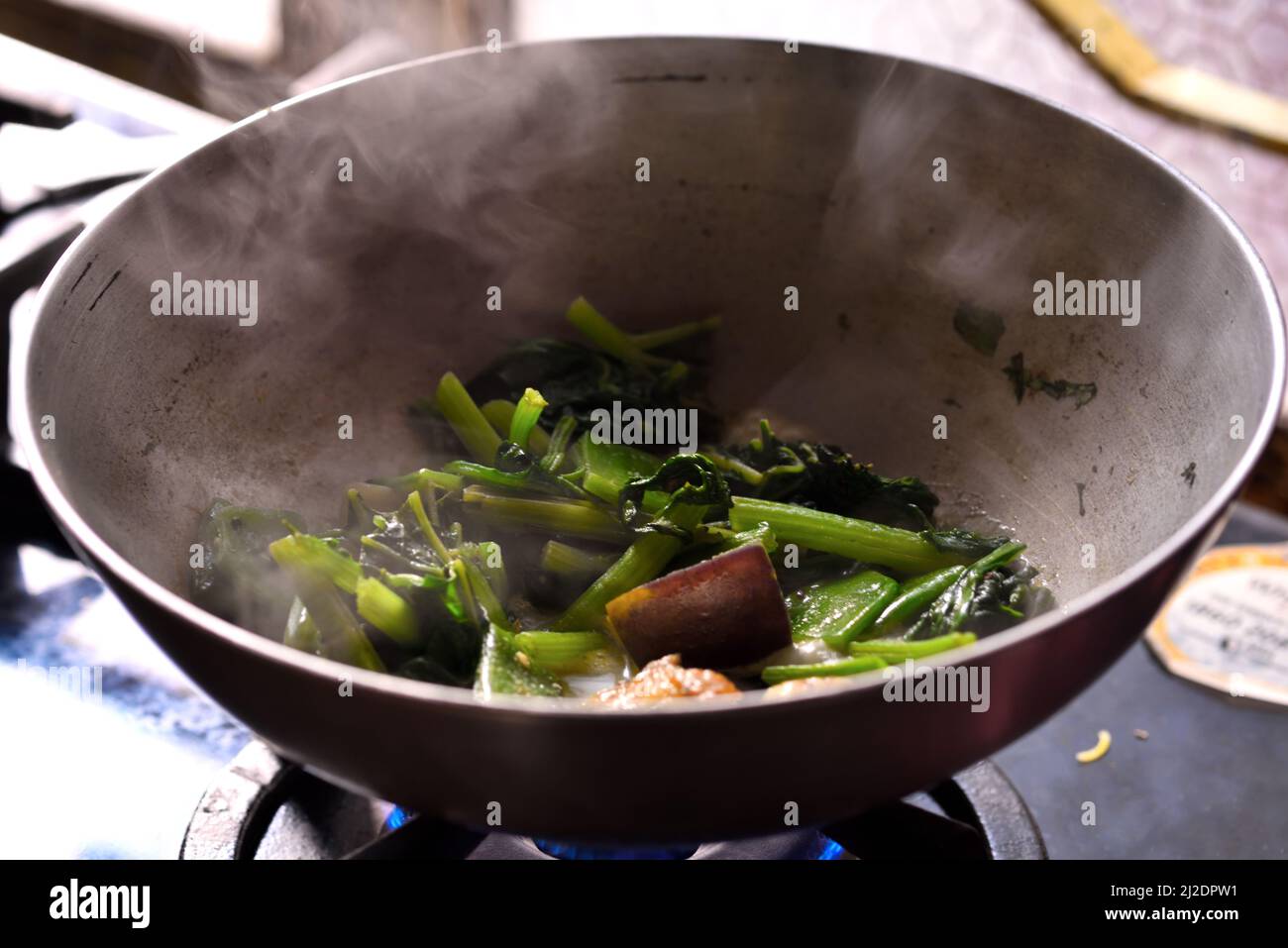 Steaming mixed vegetables in the wok, asian style cooking stock photo Stock  Photo - Alamy