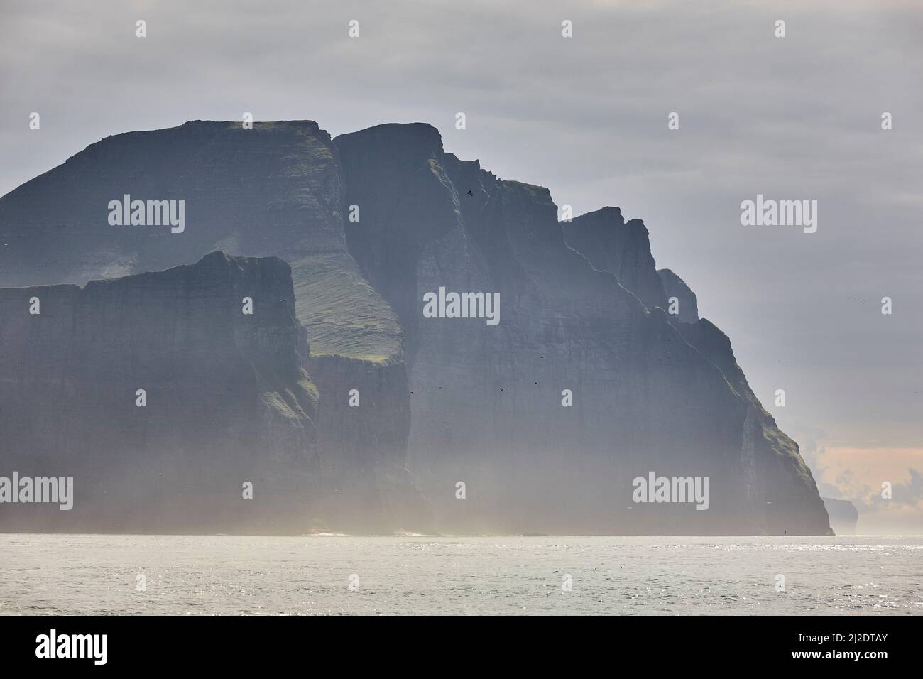 Faroe islands sunset dramatic coastline landscape in Vagar island ...