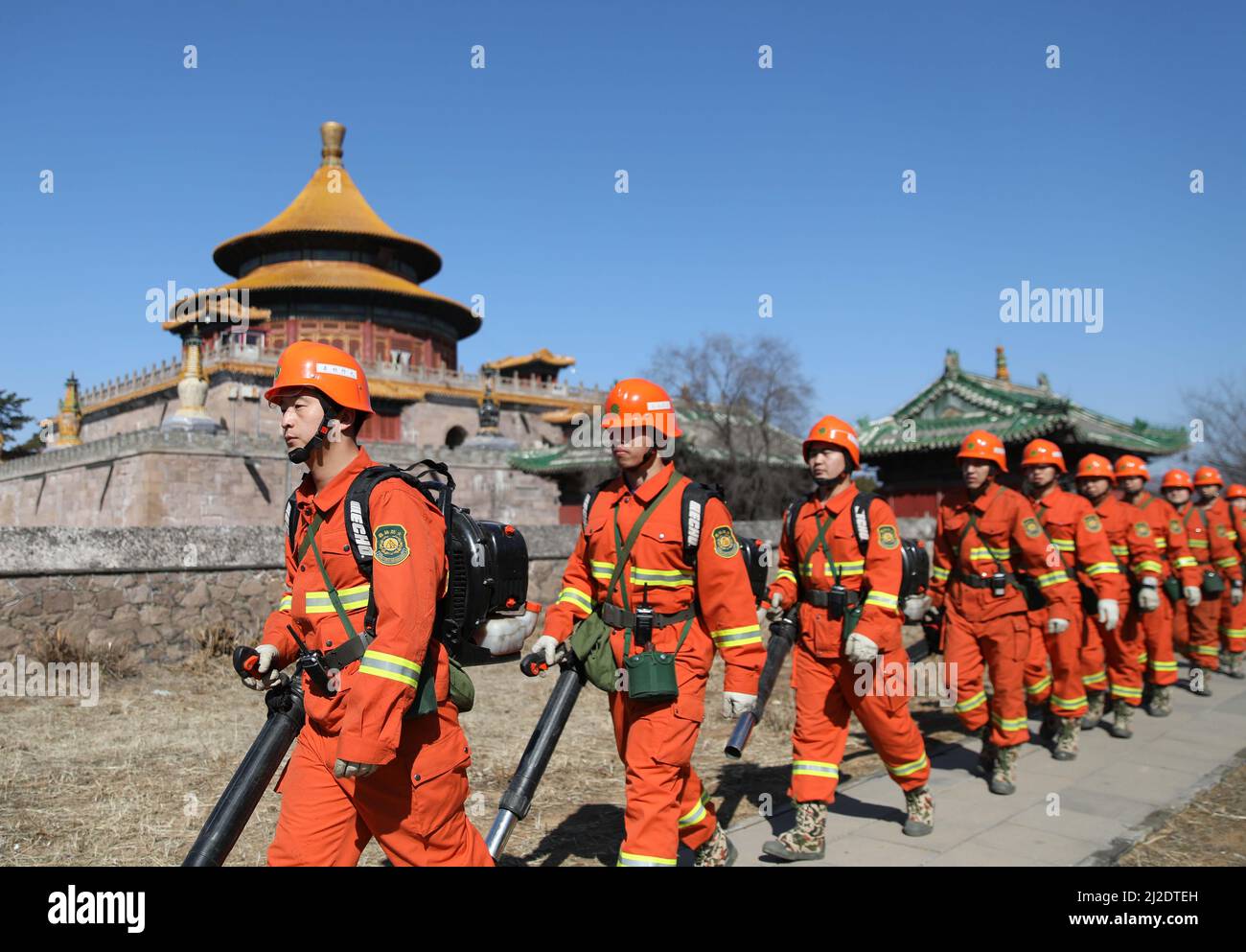 CHENGDE, CHINA - APRIL 1, 2022 - Firefighters inspect a mountain resort and its surrounding temple in Chengde City, North China's Hebei Province, Apri Stock Photo