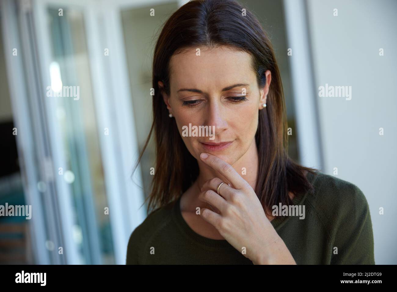 Mature woman home brown hair hi-res stock photography and images - Alamy