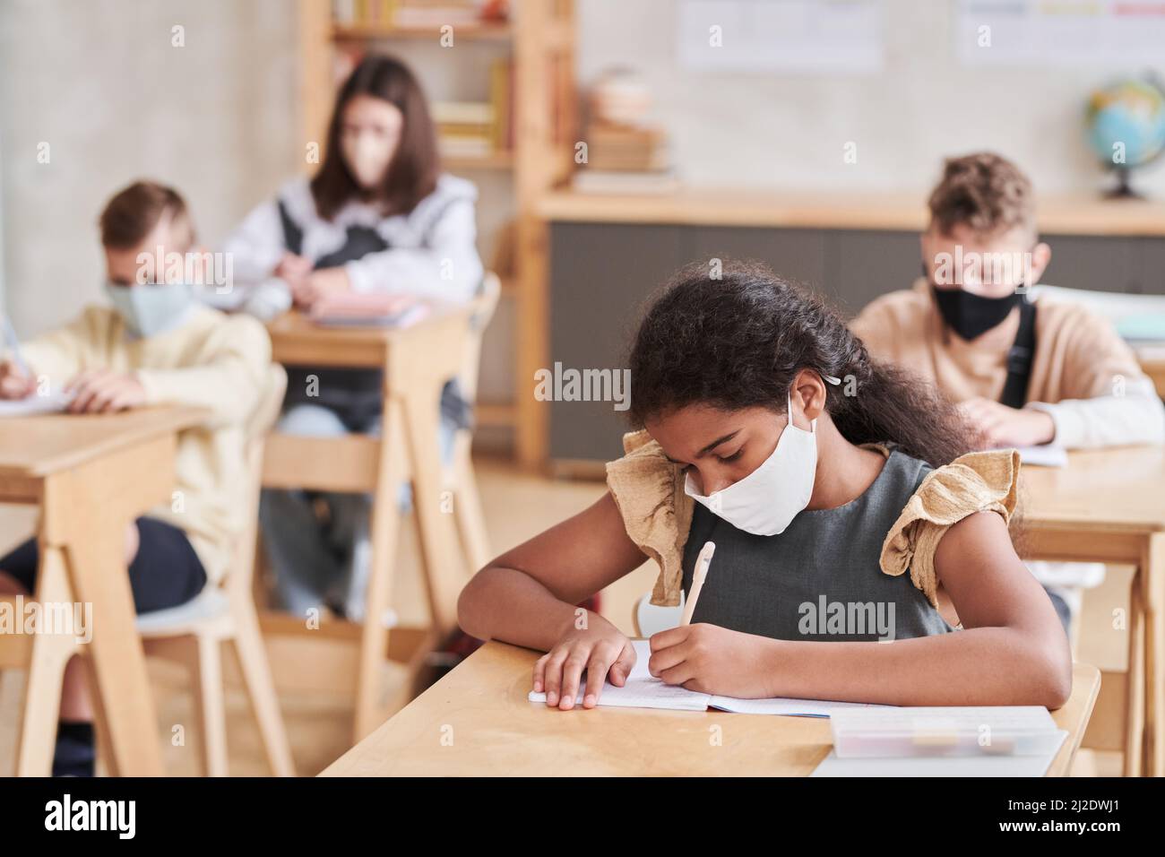 African girl sitting in classroom hi-res stock photography and images ...