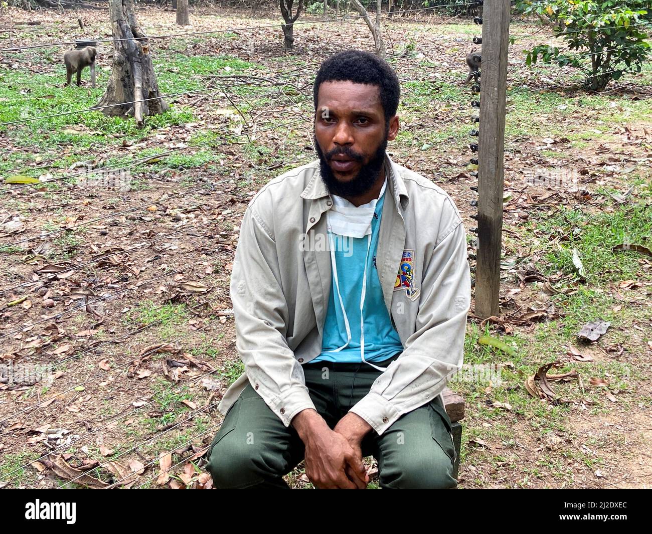 Nsikan Eninekit, assistant manager at the drill ranch, talks during an interview with Reuters in Afi Mountain Wildlife Sanctuary, Calabar, Nigeria March 8, 2022. Picture taken March 8, 2022. REUTERS/Seun Sanni Stock Photo