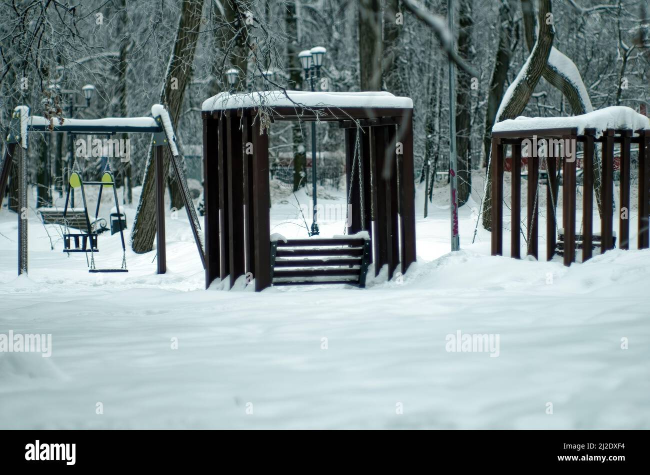 children's playground in the park, in winter Stock Photo - Alamy