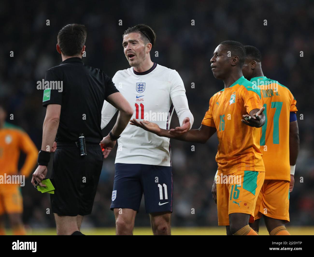 London, UK. 29th Mar, 2022. Max-Alain Gradel (IC) protests to referee Erik Lambrechts after getting a second yellow card and was sent off at the England v Ivory Coast International Friendly at Wembley Stadium, London, UK on 29th March 2022. Credit: Paul Marriott/Alamy Live News Stock Photo