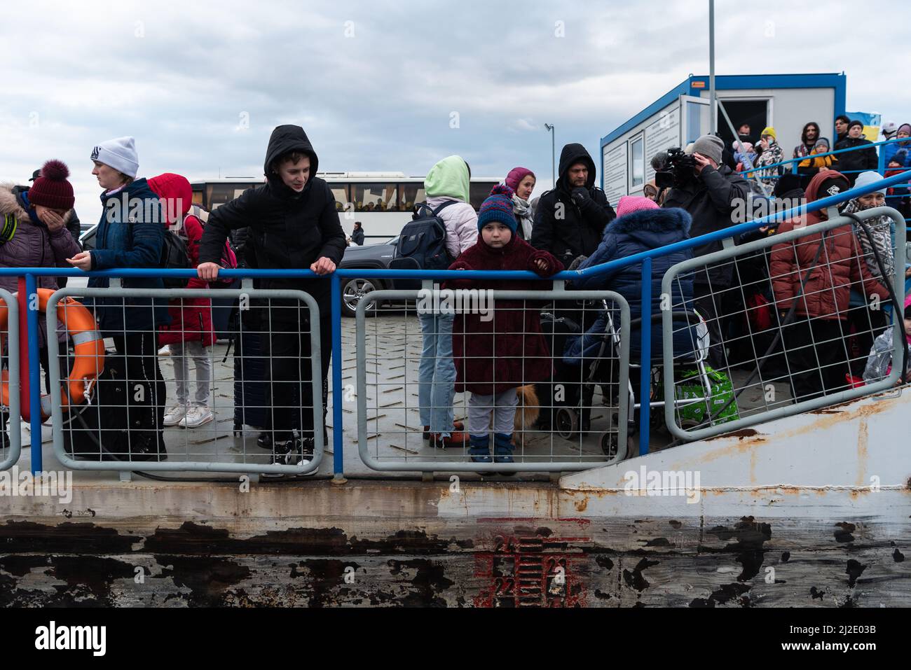 Ukrainian refugees arrive at the border station of Isaccea, Romania on February 26, 2022. Stock Photo