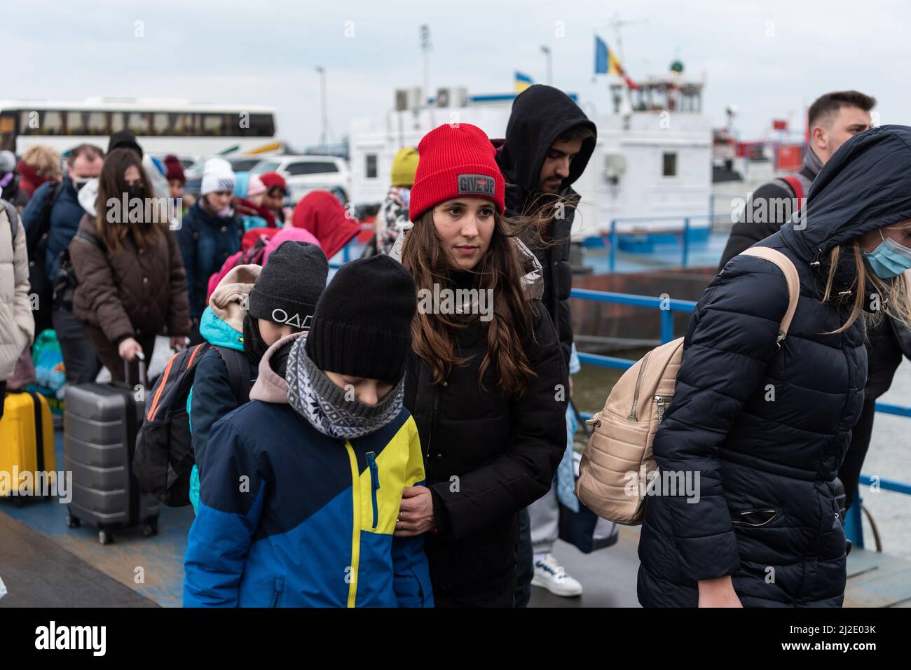 Ukrainian refugees arrive at the border station of Isaccea, Romania on February 26, 2022. Stock Photo