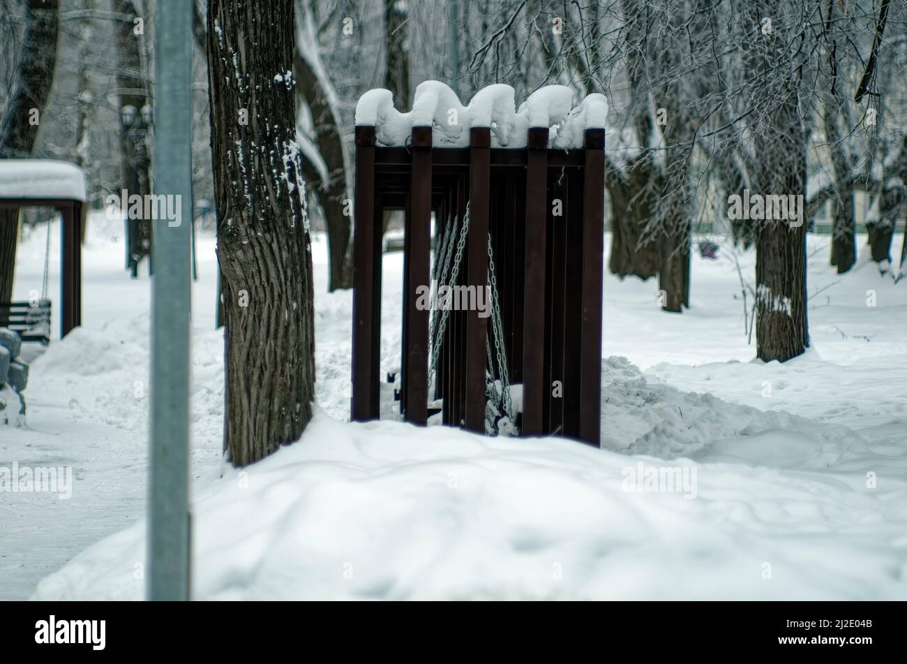 children's playground in the park, in winter Stock Photo - Alamy