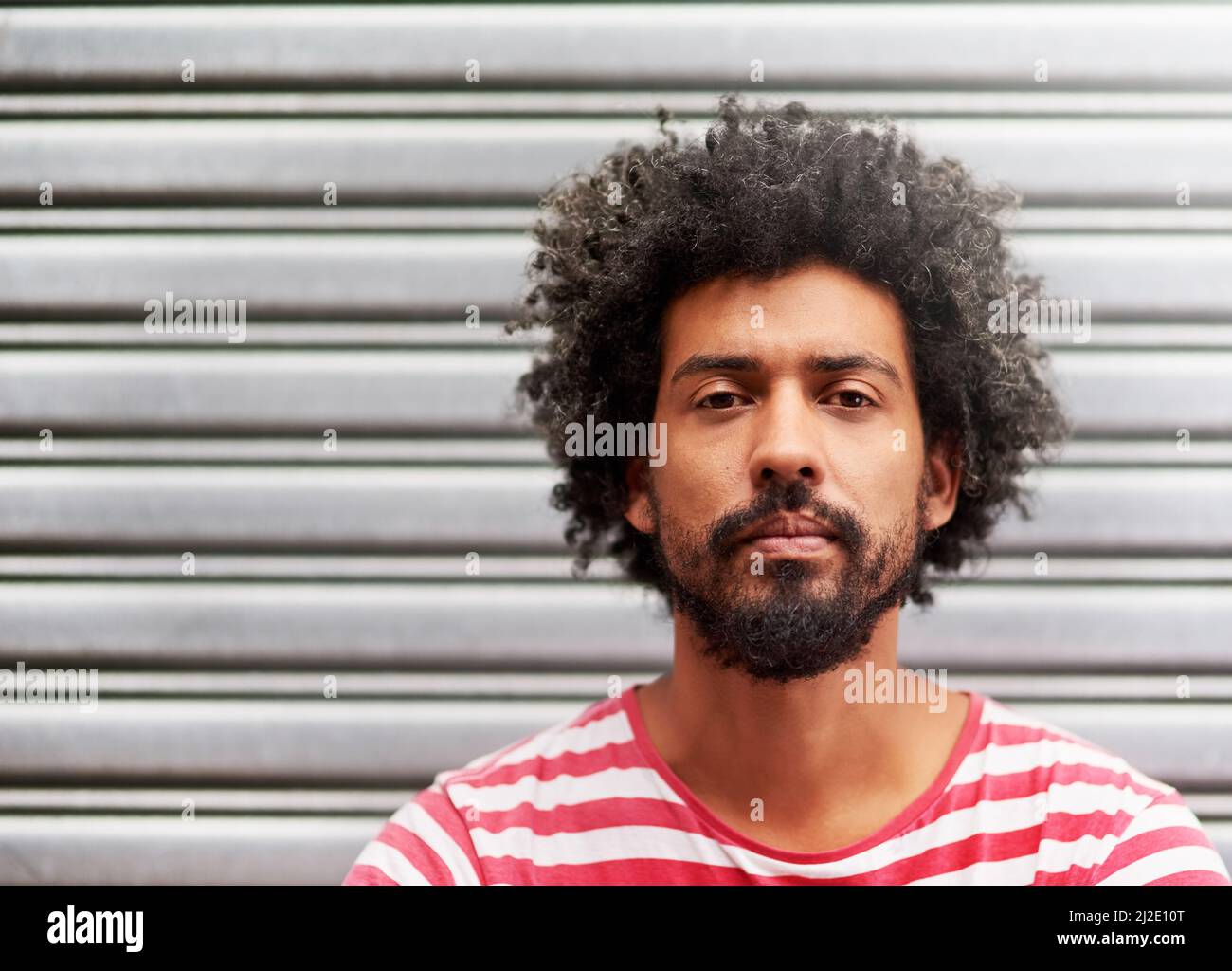 Stylish modern young curly man hi-res stock photography and images - Alamy