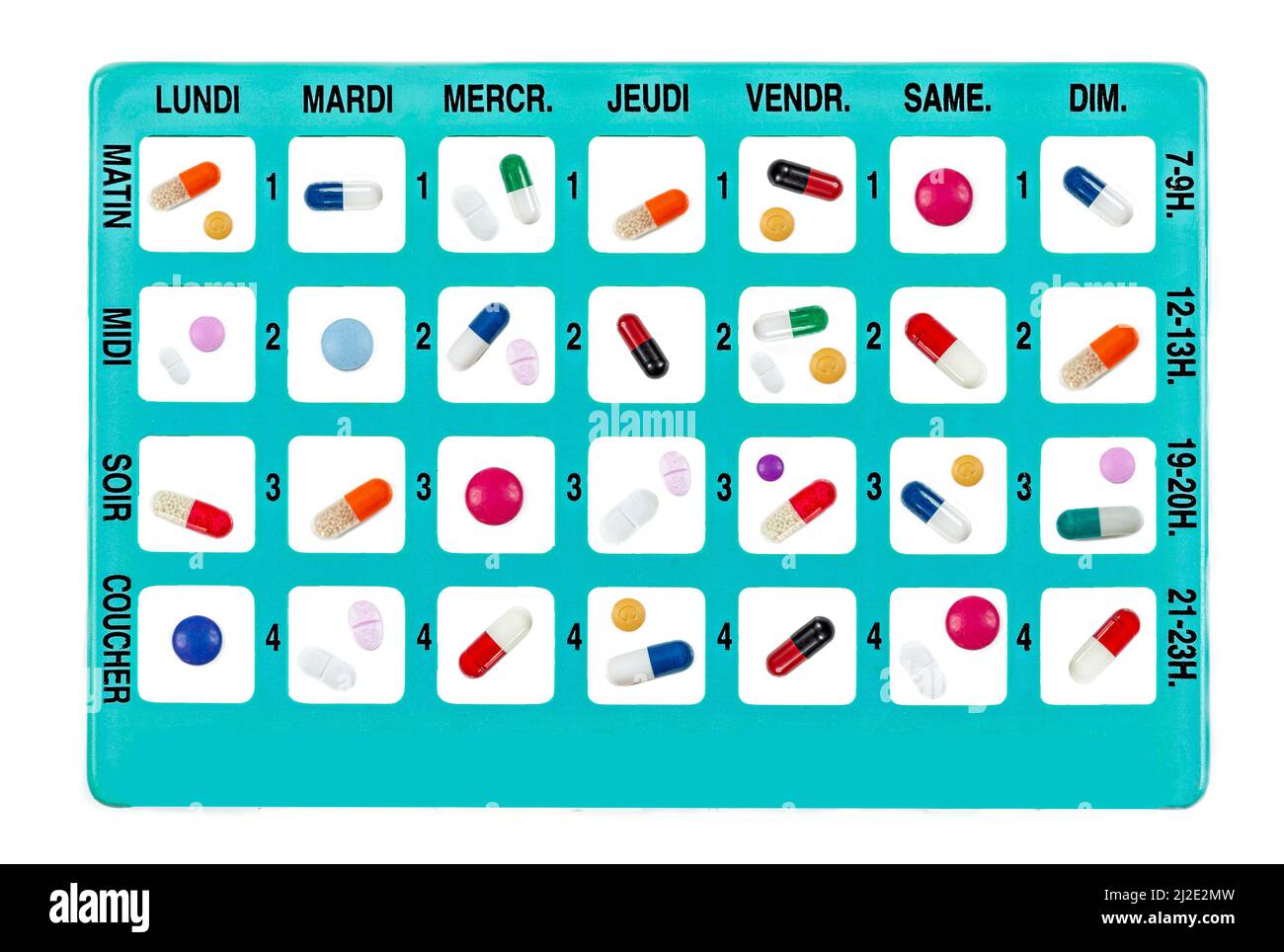 Weekly medicines set in a pillbox for daily use in french Stock Photo